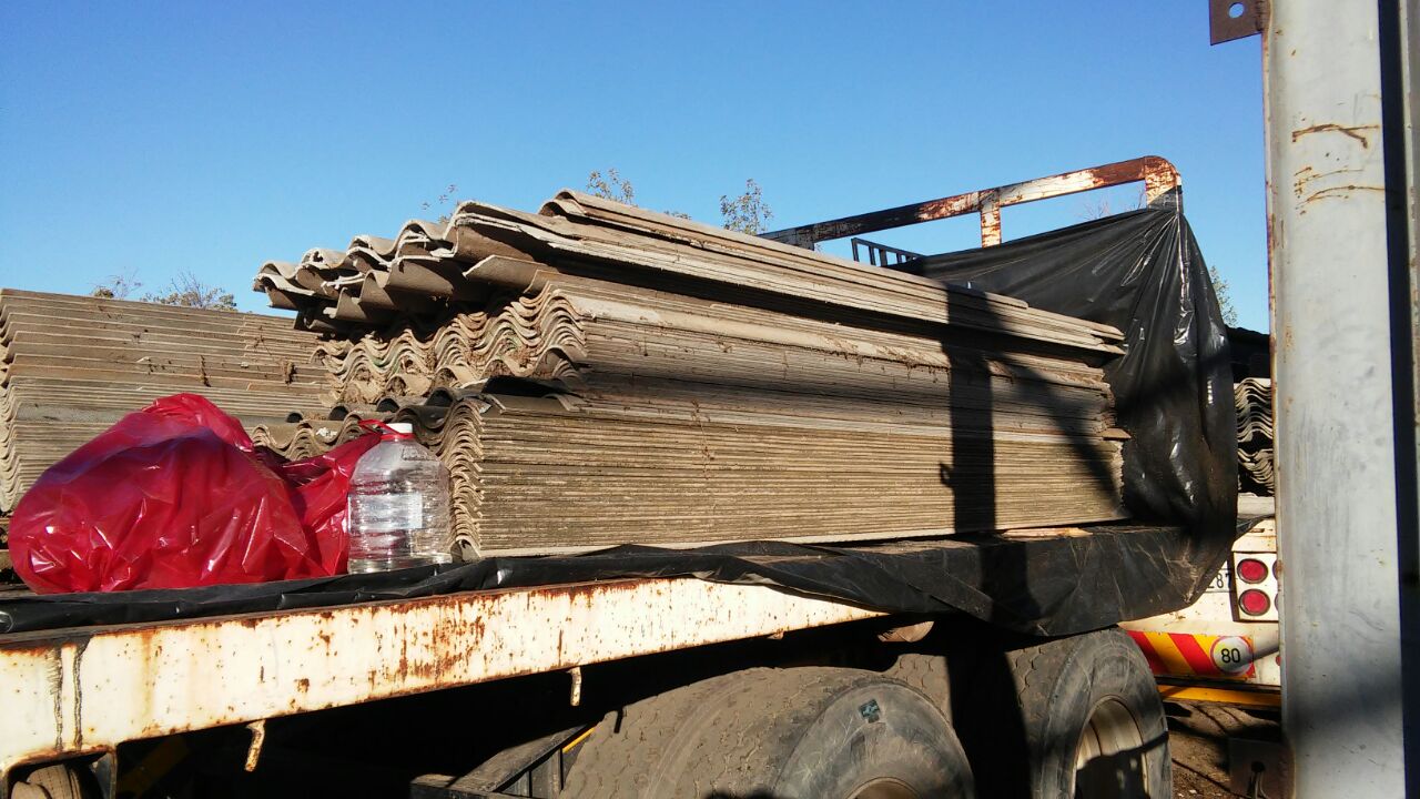 asbestos sheets on back of truck